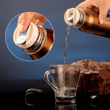 Thermos en forme de balle d'arme